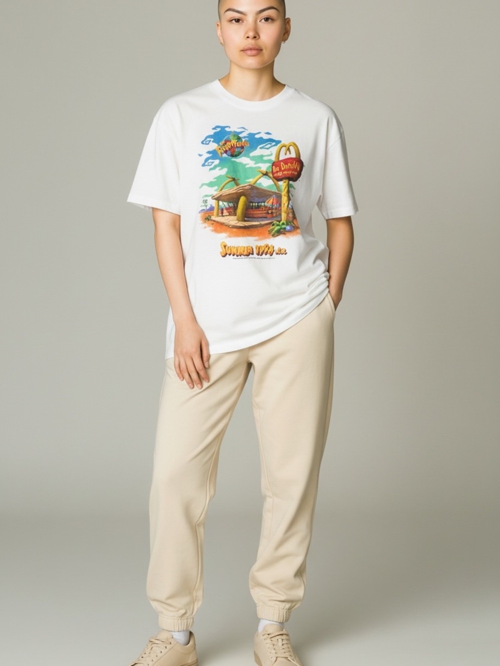 Vintage McDonald's White Tee with Multicolor Flintstones Beach Graphic